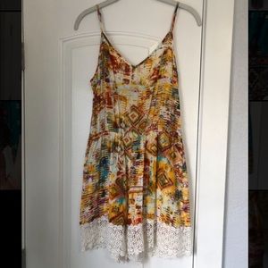 Yellow romper with lace detail, size M with adjustable straps